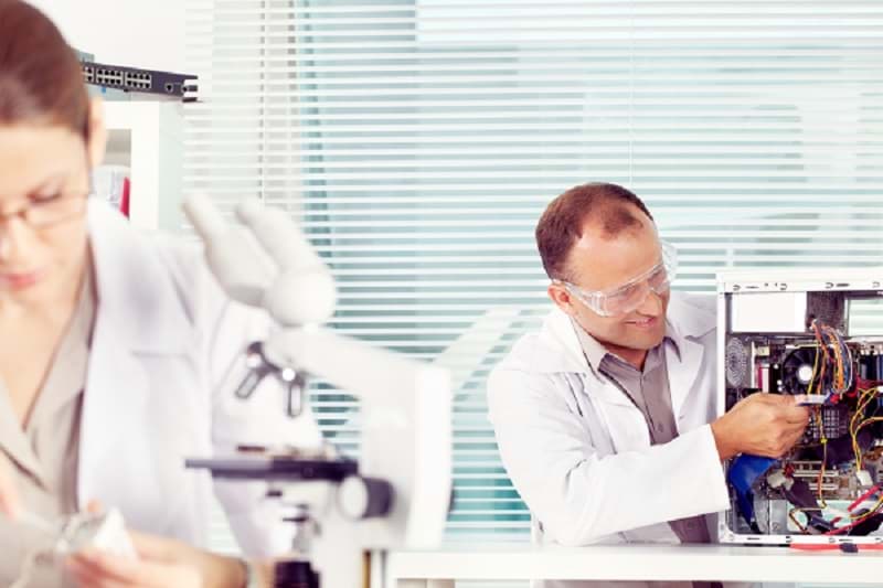 Scientist reparing complicated system Scientist reparing complicated system